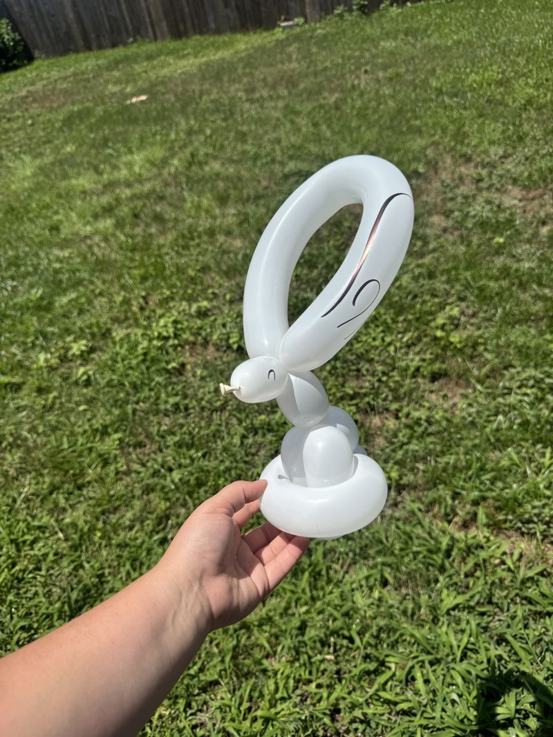 White balloon bunny sculpture at a kids party in Texas
