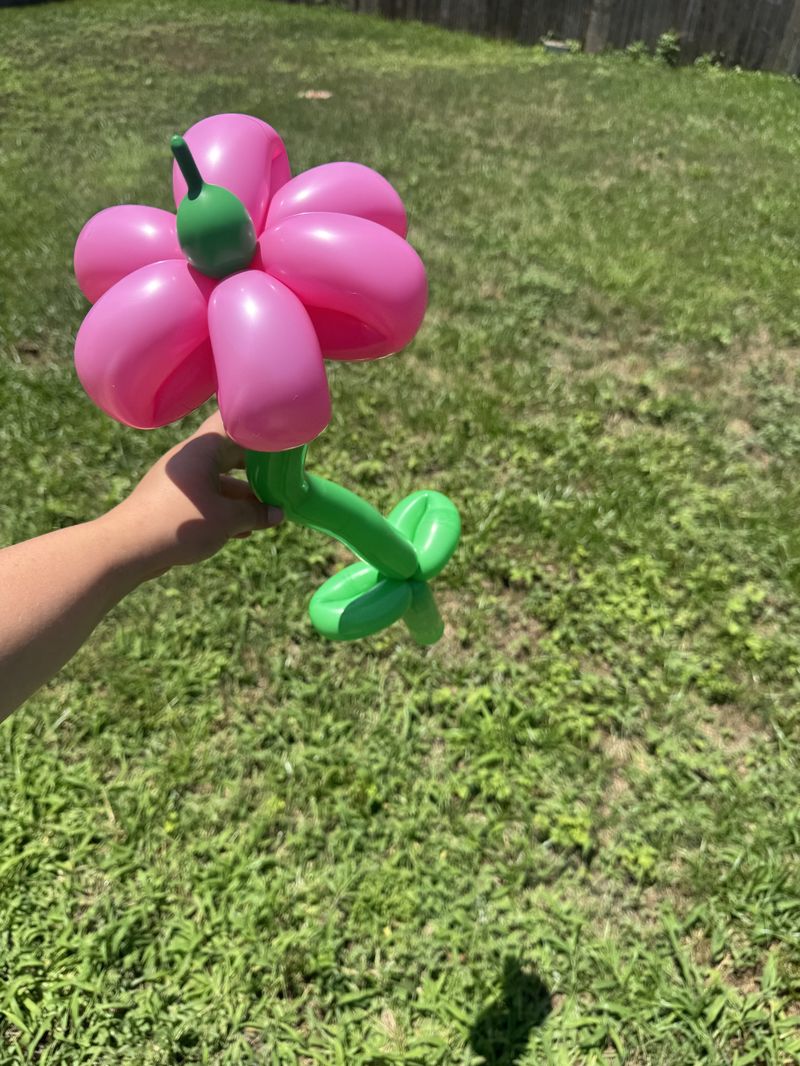 Pink and green balloon flower for party entertainment in Texas