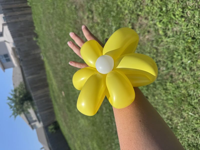 Yellow balloon flower at a kids party in Texas